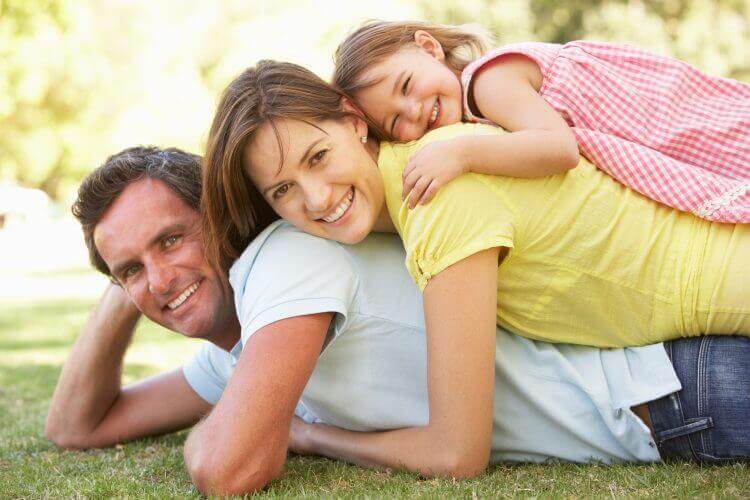 family lying on top of each other