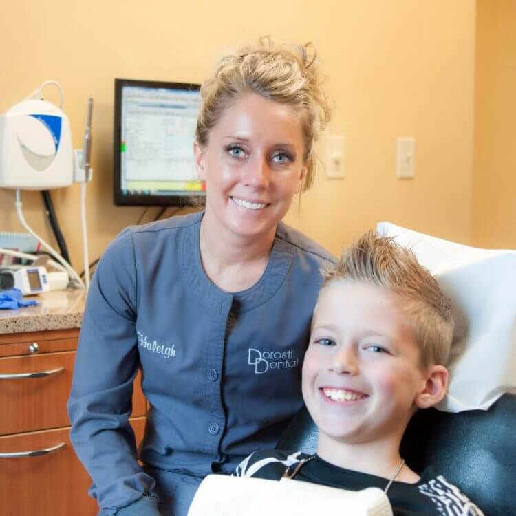 Dentist and Patient Smiling