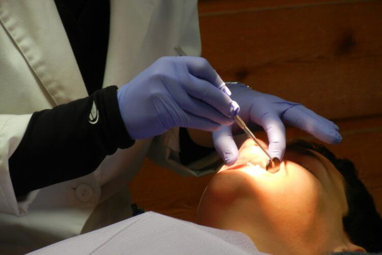 Dentist Working on Patient